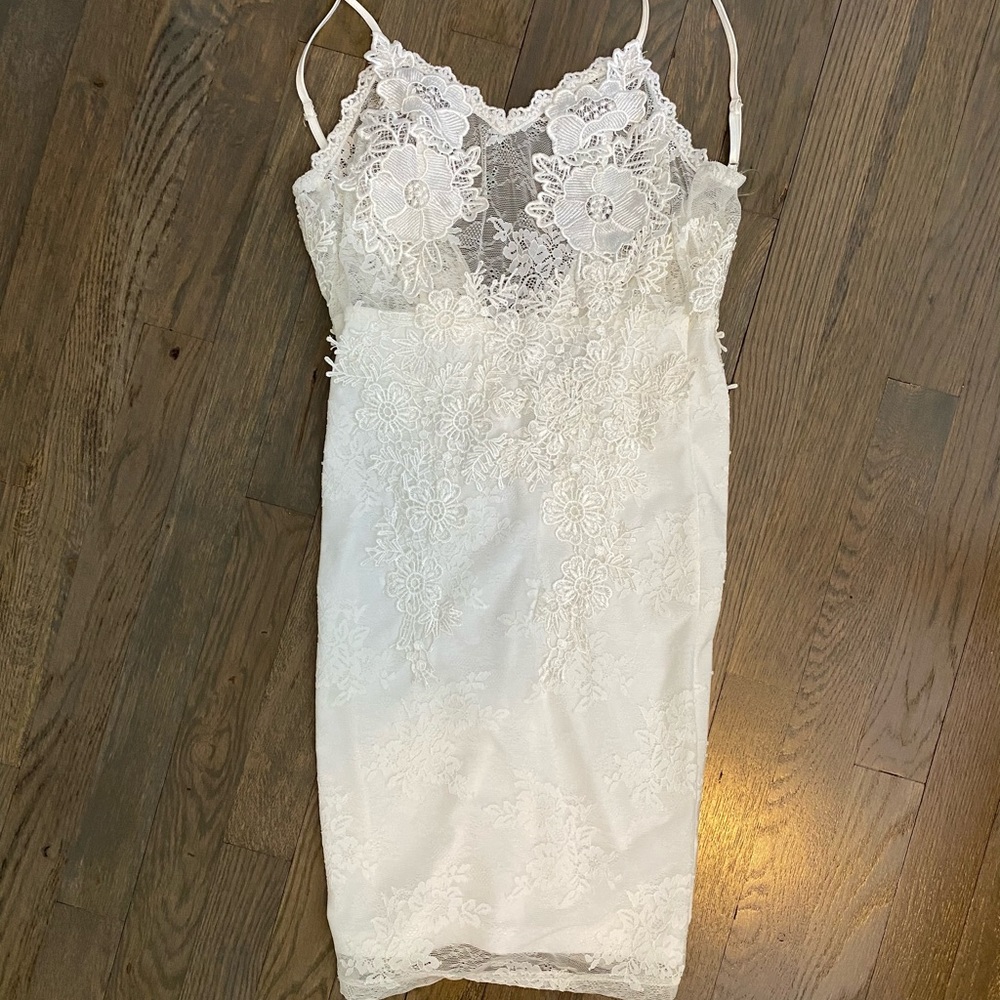 White lace mini dress by fashion nova. NWT Size xs